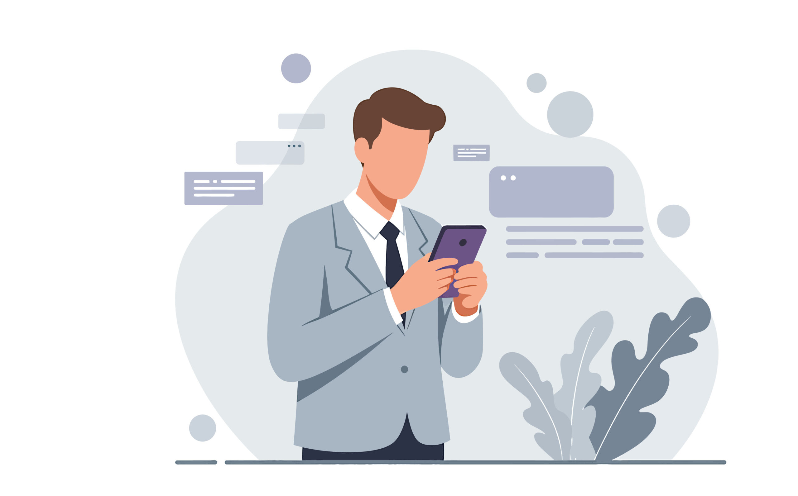 A businessman in a gray suit is attentively using his smartphone